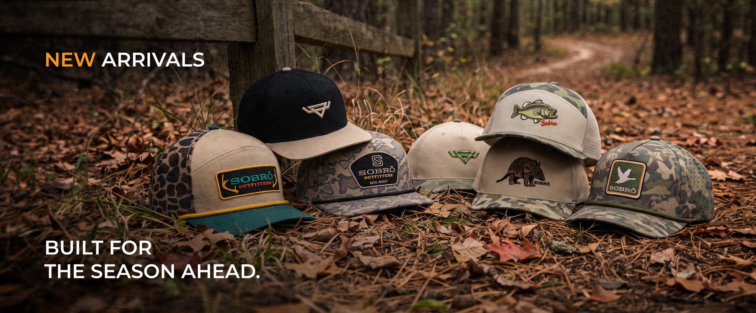 Sobro camouflage headwear with custom embroidered logos and patches in the woods